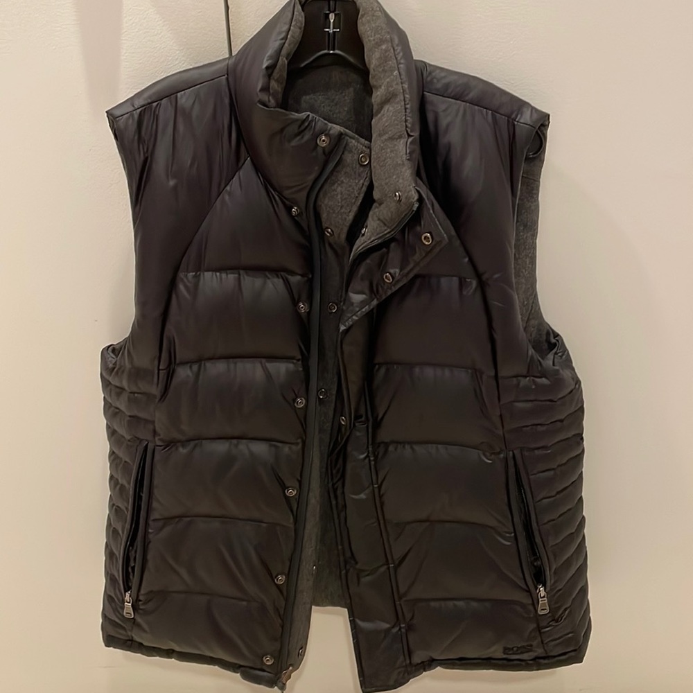 Men’s reversible down quilted vest, black nylon/grey wool, pockets both sides